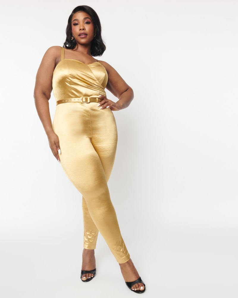 Front of a model wearing a size 4X Unique Vintage Gold Spandex Belted Jumpsuit in Gold by Unique Vintage. | dia_product_style_image_id:319654